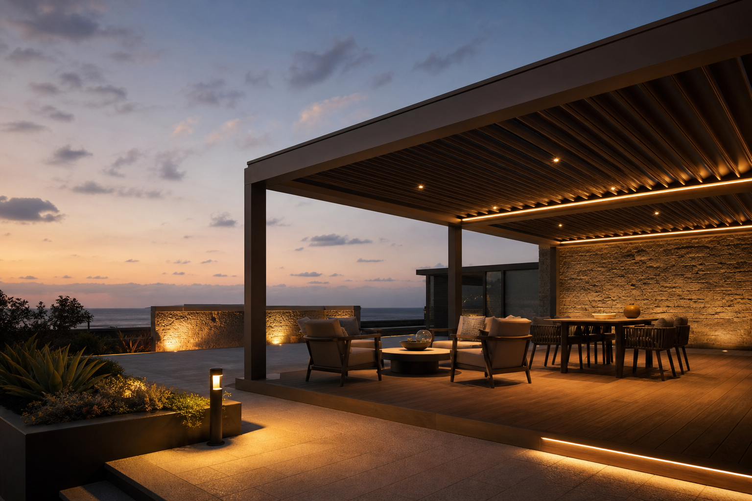 Luxury hospitality terrace with modern pergola, premium decking, and integrated exterior architectural lighting.